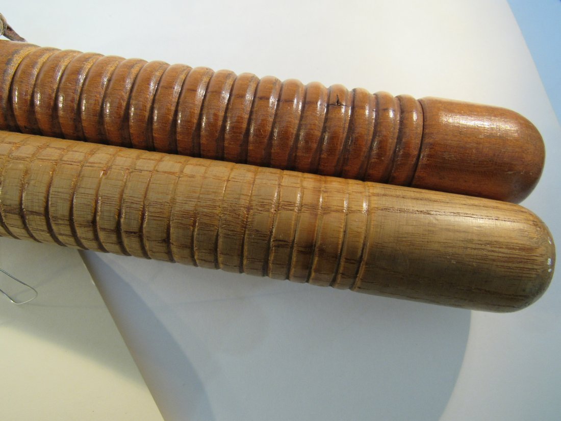 2 Vintage oak police batons, nightsticks, billy club: 29" long,with ribbed grips, both are 1" diameter solid oak
