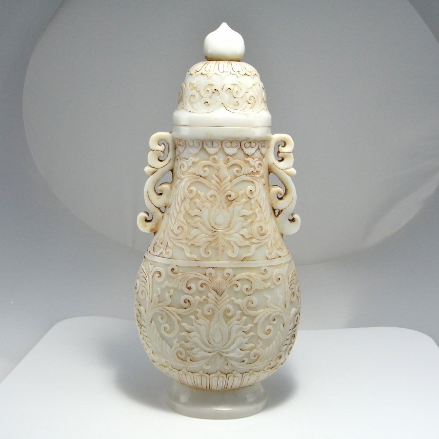 18th C Mutton Fat JADE Lidded Vase Qianlong Qing: Circa 1750 18th Century It is a tall vase measuring 9 1/4" tall including the lid by 4 3/16" wide by 2 9/16" deep with the lid itself being 2 3/8" tall (235mm x 106mm x 65mm, 61mm) 756 grams