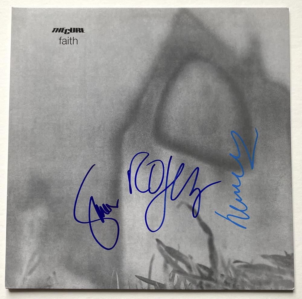 Cure Fully Group Signed â€œFaithâ€ In-Person Album Record (JSA Authentication): â€œFaith” album signed on the cover in blue felt tip and paint pen by Robert Smith, Lol Tolhurst, and Simon Gallup. Obtained in-person and in fine condition. Accompanied by a JSA LOA.