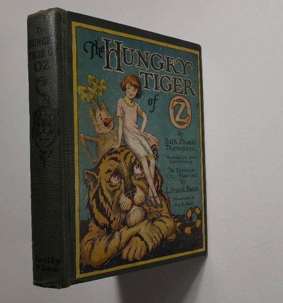 Ruth Thompson, The Hungry Tiger of Oz, 1st/1st, 1926: "The Hungry Tiger of Oz", by Ruth Plumly Thompson, founded on and continuing the Famous Oz Stories by Frank Baum, illustrated by John R. Neill, published by Reilly & Lee, Chicago, 1926, first edition,