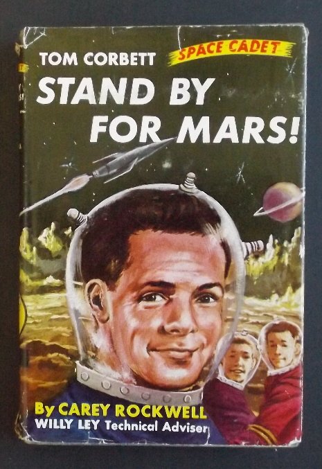 Rockwell, Stand by for Mars, A Tom Corbett 1961 ill.: "Stand by for Mars! A Tom Corbett Space Cadet Adventure" (the first book in the 'Tom Corbett Space Cadet Adventure' series), by Carey Rockwell, Willy Ley technical adviser, illustrated, published by G