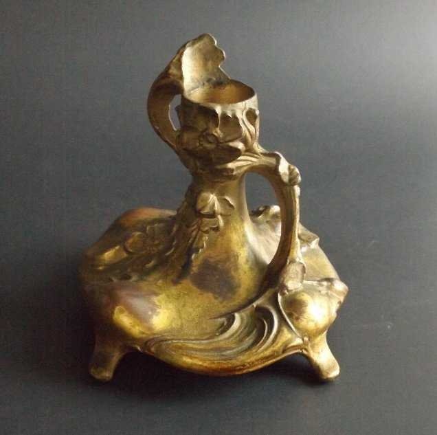 Art Nouveau candle holder, French Austrian 1920s: Antique French or Austrian Art Nouveau candlestick, candle holder, 1920s. Tin plated with copper and bronze plated over the copper layer. US: Priority (c 2-4 days) ------- $12.50 Canada: Priority (c. 