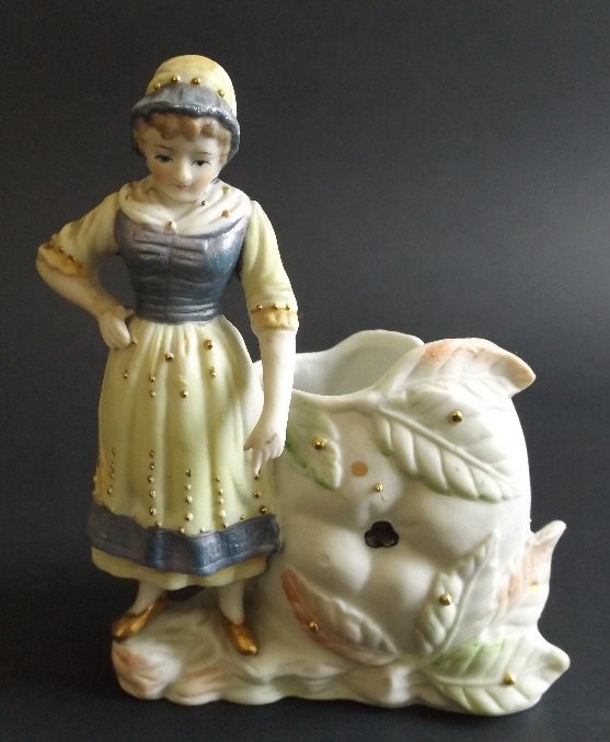 Bisque Girl, Occupied Japan Paulux Figurine Vase: Vintage Bisque figurine with vase /planter in shape of an apple, hand painted, marked 'Paulux Made in Occupied Japan' [1947-1952]. US: Priority (c 2-4 days) --------- $16.50 Canada: 1st Class (c. 2-6