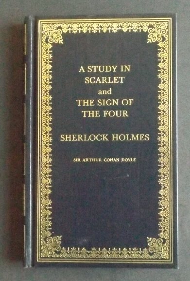 Doyle Study in Scarlet Sign of the Four Sherlock Holmes: "A Study in Scarlet and The Sign of the Four. Sherlock Holmes", by Sir Arthur Conan Doyle, published by The Peebles Classic Library, New York, 1975. Provenance This book is a former property of Susan 