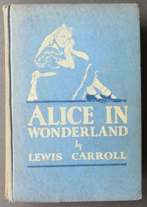 Carroll, Alice Wonderland Looking Glass Movie Ed.1933: "Alice's Adventures in Wonderland and Through the Looking-Glass" (Complete in One Volume), by Lewis Carroll. Published by Grosset & Dunlap, New York, copyright 1933, First Photoplay Edition, with illu