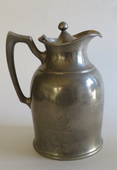 Antique Thermos Pitcher, 1917, Landers Frary & Clark: Antique silvery plate insulated thermos pitcher, tea pot with a mercury glass insulation inside. It is marked on the bottom "Landers, Frary & Clark UNIVERSAL and a list of patents: June 13, 1916 throu