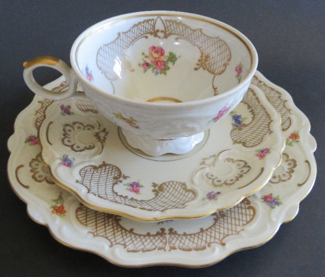 Rococo Tea Set, Cup, Saucer, Plate, Schirding, Germany: Vintage Bavarian Rococo design tea set: cup, saucer, desert plate, by Schirding, German porcelain manufacturer. This particular porcelain mark with the larger Edelweiss flower on each item was applied
