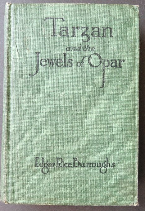 Burroughs, Tarzan and Jewels of Opar, Burt 1918: "Tarzan and the Jewels of Opar" by Edgar Rice Burroughs, frontispiece by Allen St. John, published by A.L. Burt, New York, "by arrangement with A.C. McClurg Company" [later edition printed from McClur