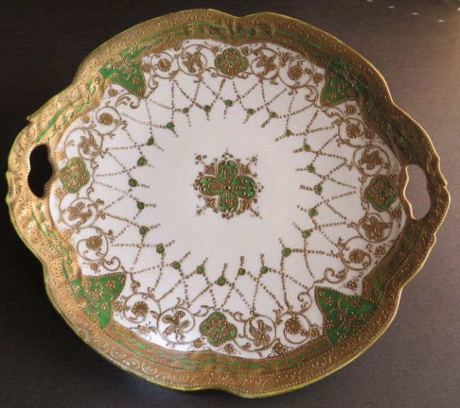 Maple Leaf Nippon Large Porcelain Platter 1900s-1910s: Large platter, gold, moriage gold and green decorations, marked with Maple Leaf \"Nippon\" and \"Hand Painted,\" authentic porcelain mark which is c. ¼\" high [known fakes and imitations are &f