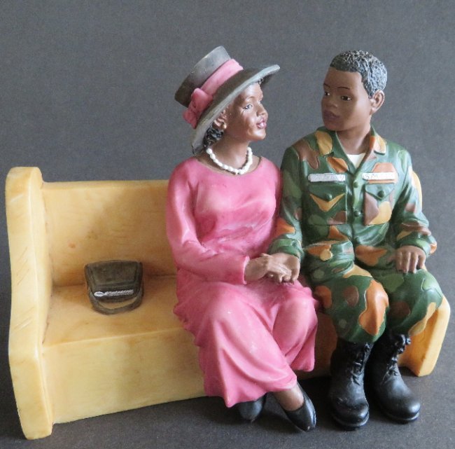 Soldier & Wife on Church Pew African American figurines: Young Soldier and His Wife on Church Pew, African American figurines, "Heaven & Earth" series; hand painted hard resin, marked "(c) UTI"; United Treasures Inc, 1990s; American Folk Art. The pew is 6" 