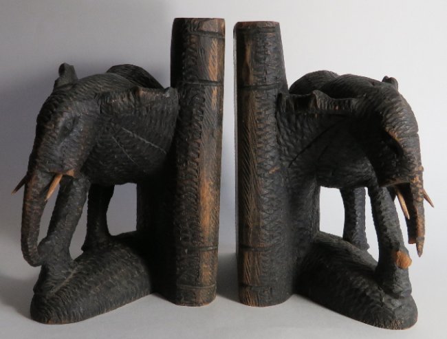 Pair Antique Hand Carved Wood Elephant Bookends 1910s: Antique pair of hand carved wood elephant bookends, probably 1910s-1930s, unmarked. The rounded head is a characteristic of African elephant, therefore these bookends are probably from Africa. The boo
