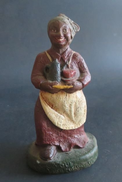 Vintage Figurine, Louisiana Mammy African American Folk Art 1980s Old South Series: Vintage figurine, "Famous Louisiana Mammy"is marked by the artist in sculpting material on the side of the base, c.1980s, hand painted hardwood resin. The surface structure mimics antique wood figurin