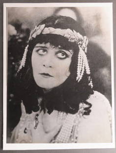 Theda Bara, Salome, 1918, Large Silent Film Still Photo Silver Print: Vintage large Still from the silent film "Salome" (1918, director J. Gordon Edwards). Salome (Theda Bara) looks up, a garland headband with pearls hanging from her hair. Vintage silver photo print wit