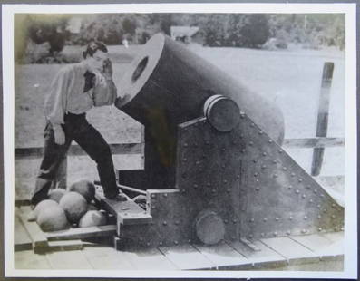 Buster Keaton, The General 1926, Large Silent Film Still Photo Silver Print: A large vintage still from the silent film "The General" (1926, directed by Buster Keaton and Clyde Bruckman). A train engineer Johnnie Gray (Buster Keaton) eavesdrops the loaded cannon which is in pr