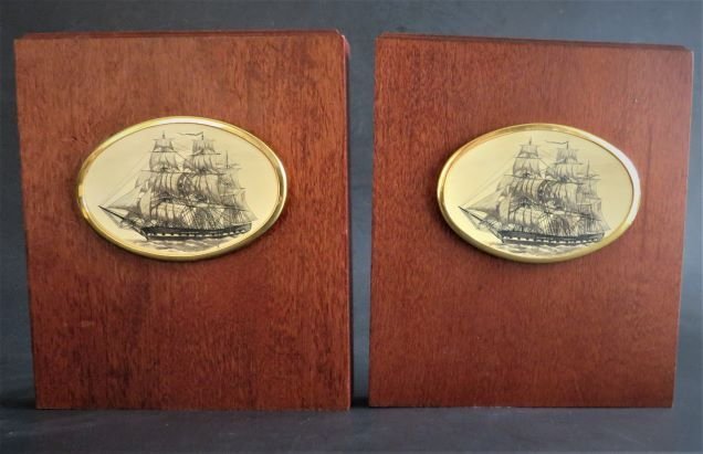 Set of 2 Vintage Faux Scrimshaw Style Barlow Bookends, 1980s: Set of two vintage Barlow bookends with engraved faux scrimshaw panels, designed by Stephen Barlow, early 1980s. The solid polished wood bookends are 5.1/2" [14cm] tall and 4.3/4" [12cm] wide, the eng