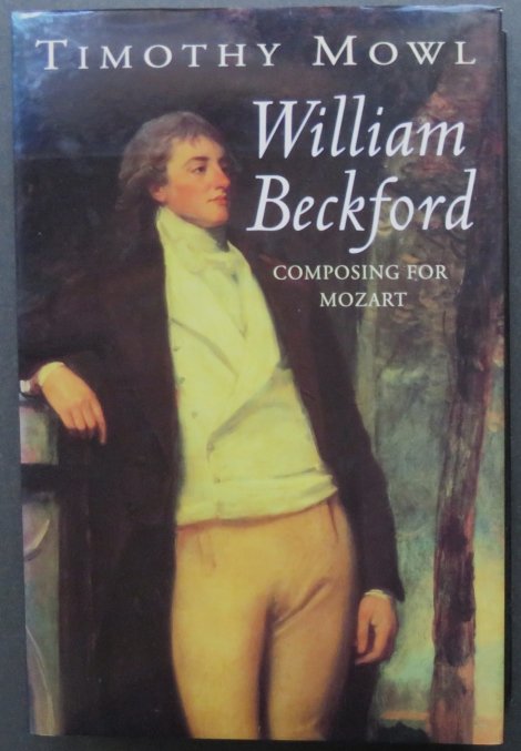 Mowl, William Beckford, Composing for Mozart, 1st UK Ed. 1998, illustrated: "William Beckford: Composing for Mozart" by Timothy Mowl, published by John Murray, London, UK, 1998. First Edition. Dust jacket with un-clipped price of L 22.00 on the front flap; hard boards, origin