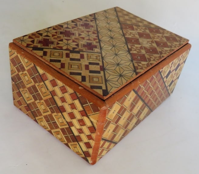 Vintage Handmade Persian Khatam Wooden Trinket Box, 1960s: Vintage handmade Khatam wooden trinket box, unmarked, mid-late twentieth century. The box is 1.3/4" [4.5cm] deep; 4.1/4" x 3" [11.5cm x 7.5cm]; a little surface wear, very good condition. Khatam is an