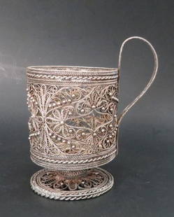 Antique Hand Made Victorian Silver Filigree Glass Holder, 1890s: Antique Victorian hand made filigree silver glass /cup holder with silver pearls and filigree base. Based on the elaborate fine work, the item appears to be created ca. 1890s-1910s. There is a hallmar