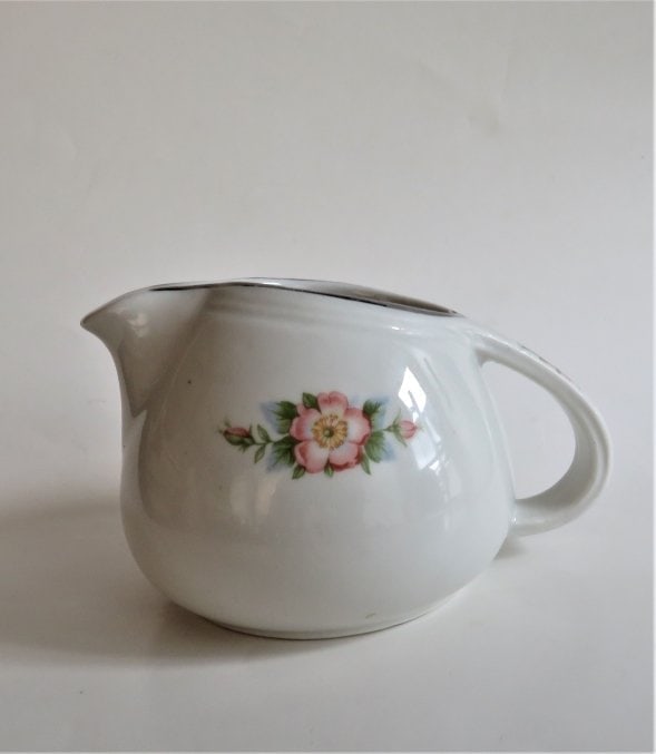 Vintage Art Deco 1940s Porcelain Hall Creamer, Rose Parade: Vintage Art Deco ceramic Rose White pattern creamer, Hall's Superior Kitchenware Pottery, Hall China, 1940s-1950s. Marked "Made in USA / Rose Parade 1259". The creamer is c.4.1/2" [11.4cm] wide with t
