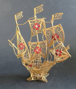 Vintage Gold PLated Spanish Galleon Sail Ship Model Portuba Portugal Filigree: Vintage Gold plated filigree Spanish galleon ship model with 5 sail adorned with enamel Maltese crosses, marked Portuba, Portugal, 1st half of the twentieth century. The galleon is c.5.1/4" tall; 5" x