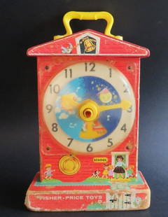 Original Mid Century 1960s Fisher-Price Music Box Teaching Clock: Vintage Mid Century Modern "The Fisher-Price #998 Music Box Teaching Clock", copyright 1962-1968. The clock has a wind-up music box that plays "Grandfather's Clock" in time with a "tick-tock" sound as