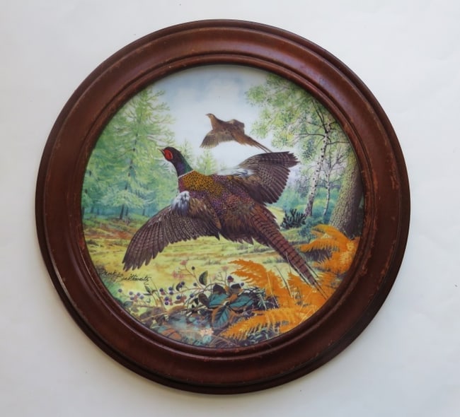 Pheasants in Flight, Royal Grafton Plate, Van Hygan & Smythe Wood Frame 1987: "Pheasants in Flight" by Derek Braithwaite, collectors' fine bone china plate limited and numbered edition by Royal Grafton, England, 1987. The Official Plate Number C8072. The special wooden frame fo
