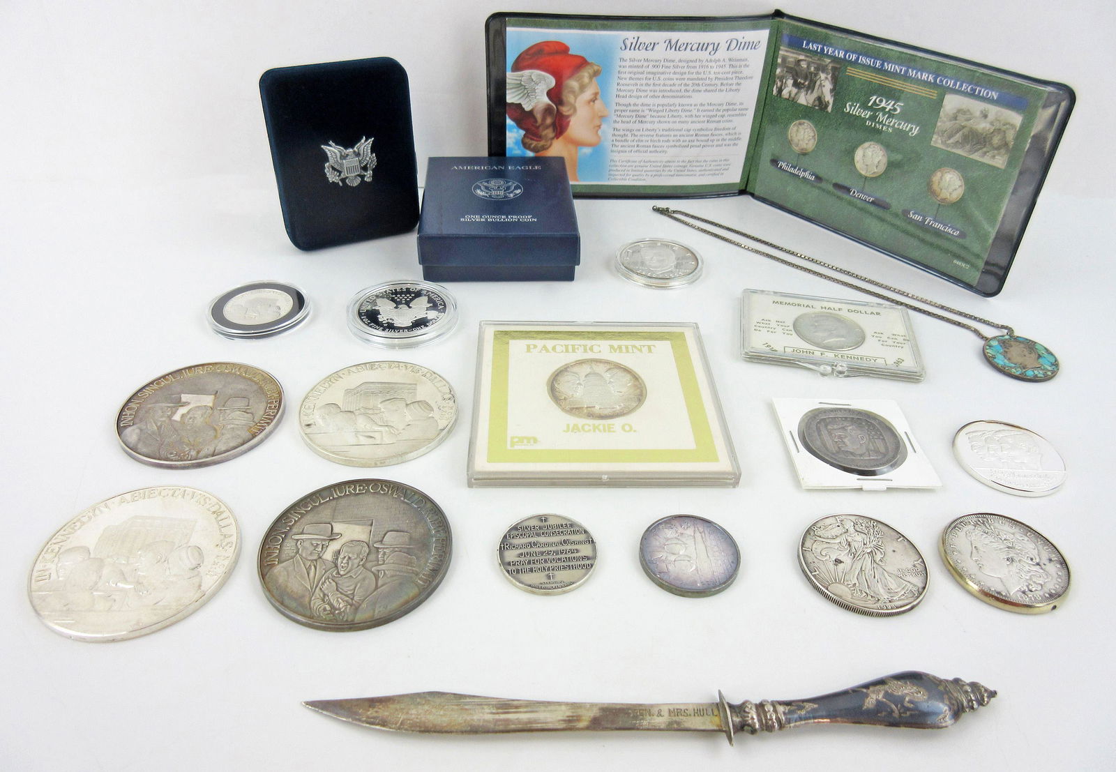 Silver Coins Incl. JFK Commemoratives, 20 Pcs, Balance: Silver Coins Incl. JFK Commemoratives, 20 Pcs, Balance of Hoskins Estate A small collection of silver coins, medals, and miscellany including pieces commemorating 35th U.S. President John F. Kennedy (
