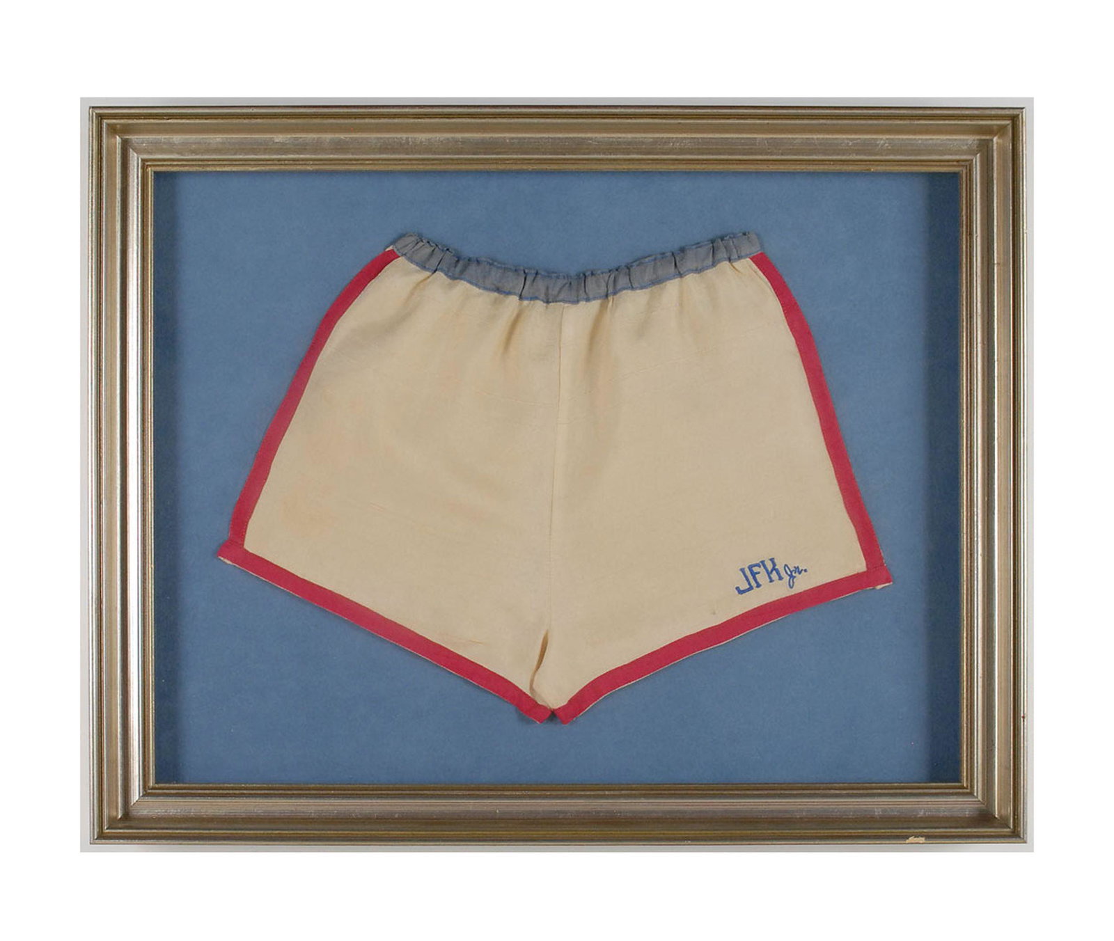 JFK Jr.’s Silk Baby Shorts Exceptional Provenance: JFK Jr.’s Silk Baby Shorts Exceptional Provenance John F. Kennedy, Jr.’s personally owned and worn off-white silk shorts from when he was a baby, patriotically trimmed in red with a light 