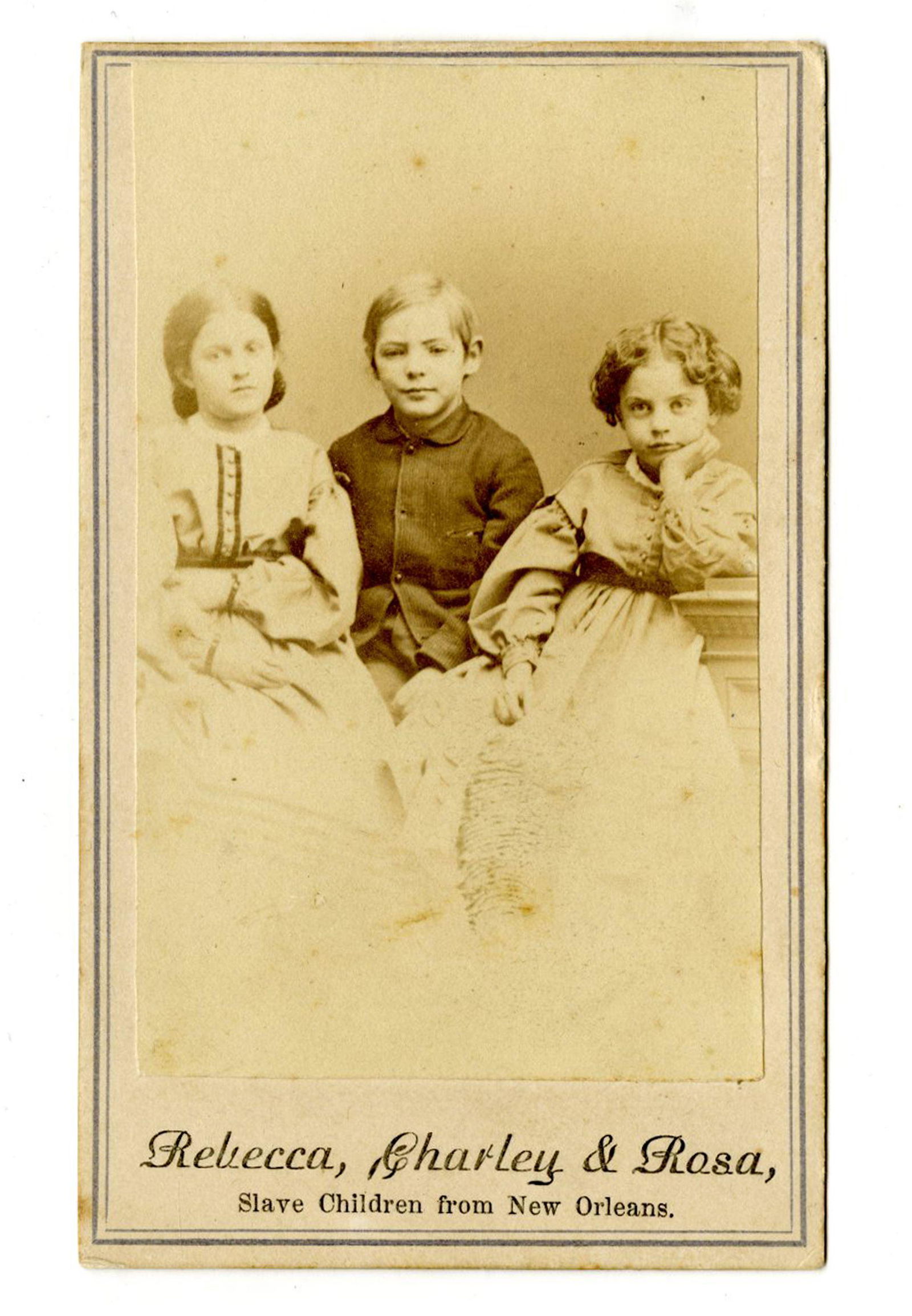Slave Children Carte-de-Visite Used by Abolitionists to: Slave Children Carte-de-Visite Used by Abolitionists to Support Education Measuring 2.375" x 4", New York, dated 1864. A vignette portrait of slave children Rebecca Huger, Charles Taylor, and Rosina D