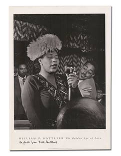 William Gottlieb Signed Photogravure of Ella Fitzgerald: William Gottlieb Signed Photogravure of Ella Fitzgerald GOTTLIEB, William. A poster-size black and white photogravure showing Ella Fitzgerald singing as an entranced Dizzy Gillespie looks on, bassist