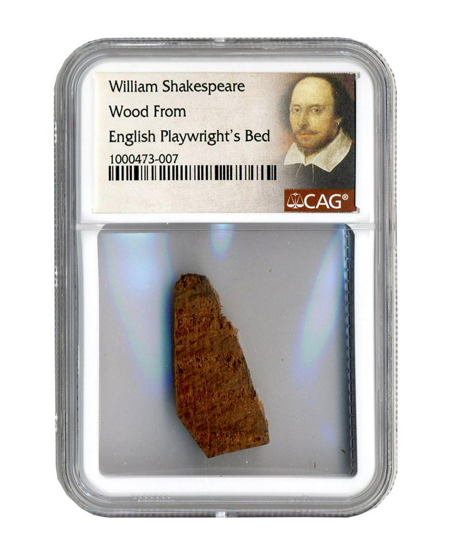 Incredible Shakespeare Wooden Fragment From His Bed! CAG Encapsulated: Incredible Shakespeare Wooden Fragment From His Bed! CAG Encapsulated Wood relic, taken from William Shakespeare's bed. .50" x 1.25". Encapsulated by CAG, measuring 2.375'' x 3.375''. The larger relic