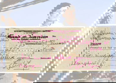 Errol Flynn Signs a Check for Repairs to His Yacht