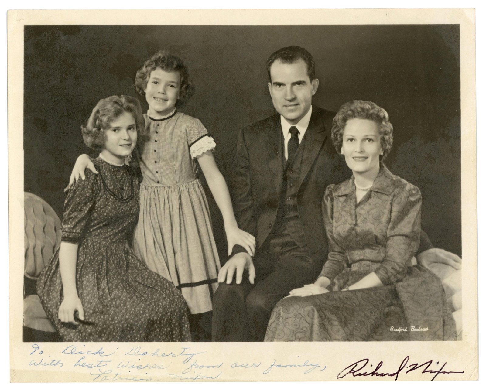 Richard Nixon and Patricia Nixon Signed Photo of Family - A Charming Image: Richard Nixon n.p., n.d. Richard Nixon and Patricia Nixon Signed Photo of Family - A Charming Image Signed photograph A signed photo showing Richard and Patricia Nixon with their young daughters in a 