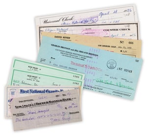 20th Century Actors & Authors Group of 8 Signed Checks: A. Haley, E. Caldwell, D. Niven & More!