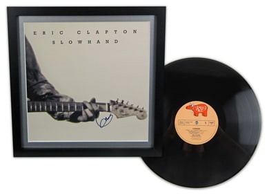 Eric Clapton Signed "Slow Hand" Album Cover, With Original Vinyl & PSA COA
