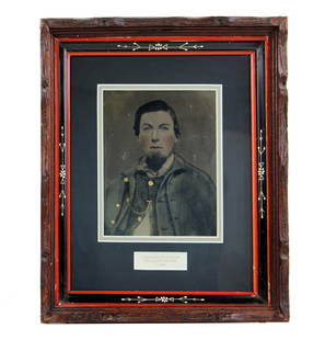 Framed Whole Plate Tintype of Young Confederate Soldier: Civil Warn.p., ca. 1862Framed Whole Plate Tintype of Young Confederate SoldierTintypeA whole plate tintype of a young Confederate soldier, ca. 1862. A studio portrait of a young male dressed in his un