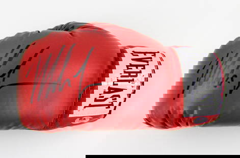 Mike Tyson Signed Boxing Glove - PSA, JSA, & Fiterman Authentication!: Mike Tysonn.p., n.d.Mike Tyson Signed Boxing Glove - PSA, JSA, & Fiterman Authentication!Signed OtherA red leather Everlast boxing glove signed "Mike Tyson" in thick black felt tip. Measures approxima