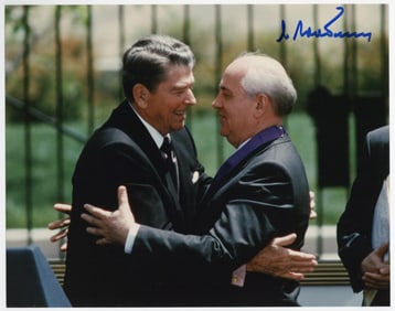 Mikhail Gorbachev Signed Photo Embracing Former President Reagan For the Honor of Receiving the