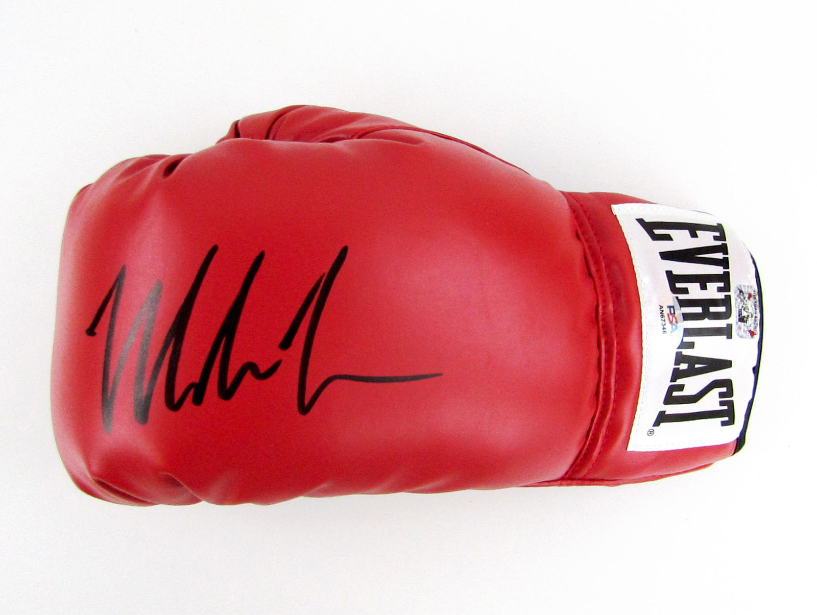 Mike Tyson Signed Boxing Glove- PSA & Fiterman Authentication!: Mike Tysonn.p., n.d.Mike Tyson Signed Boxing Glove- PSA & Fiterman Authentication!Signed OtherA red leather Everlast boxing glove signed "Mike Tyson" in thick black felt tip. Measures approximately 11
