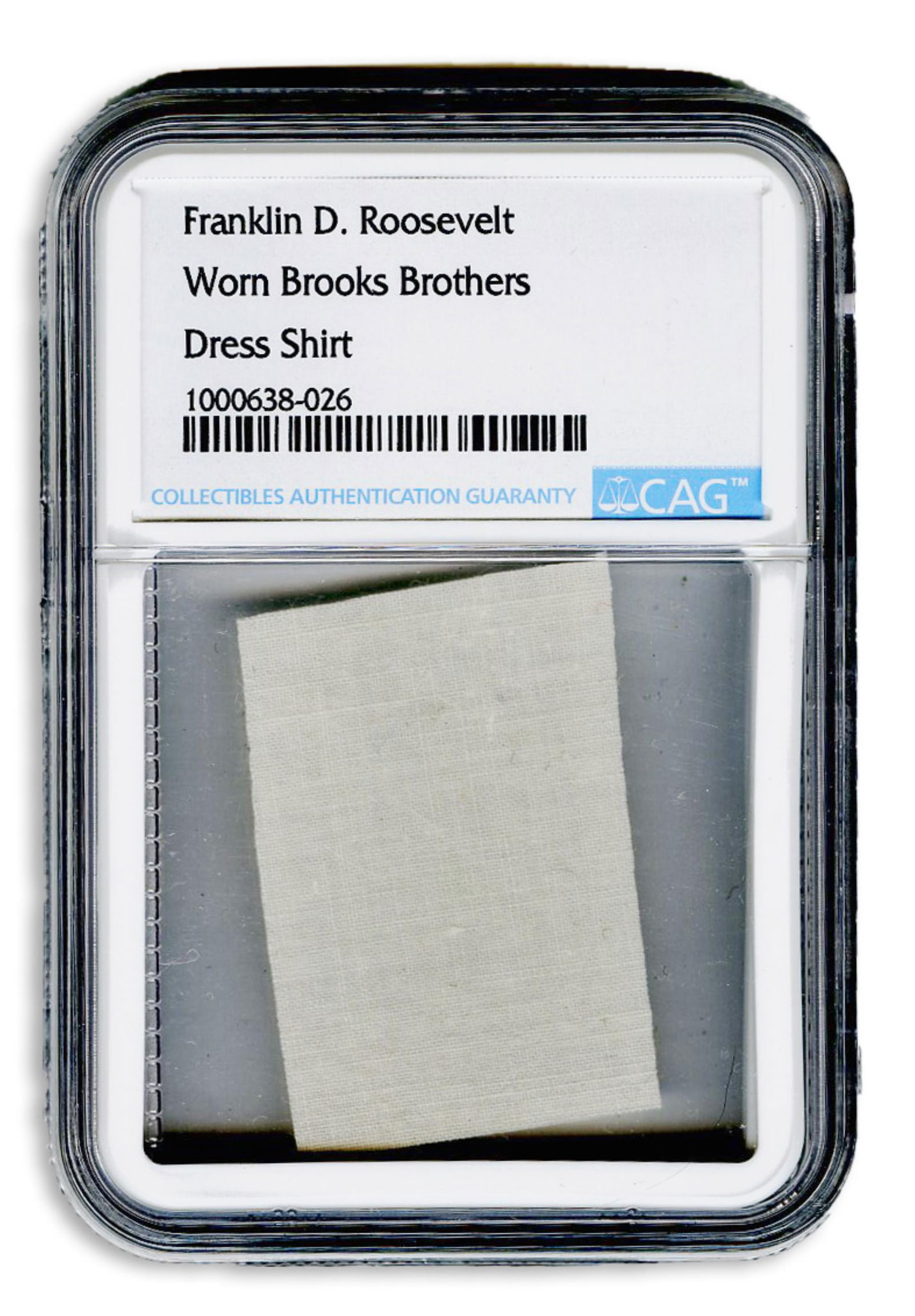 Franklin D. Roosevelt Worn Brooks Brothers Dress Shirt. CAG Encapsulated.: Franklin Rooseveltn.p., n.d.Franklin D. Roosevelt Worn Brooks Brothers Dress Shirt. CAG Encapsulated.RelicA 1." x 1.5" cut from the Brooks Brothers dress shirt of one of the most iconic figures in Ame