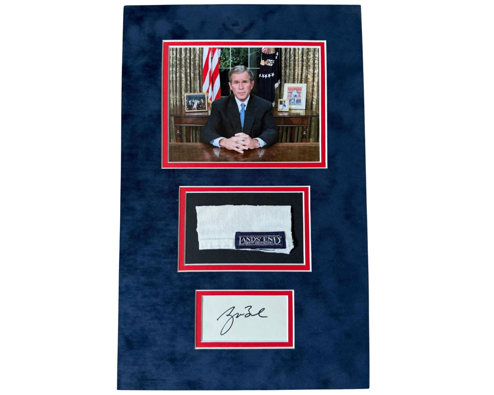 George W. Bush Signed Display w/ Worn Shirt Swatch, Ex-Sutton - Bush White House Valet!: George W. Bushn.p., n.d.George W. Bush Signed Display w/ Worn Shirt Swatch, Ex-Sutton - Bush White House Valet!RelicStunning presentation display featuring an authentic shirt swatch worn by President