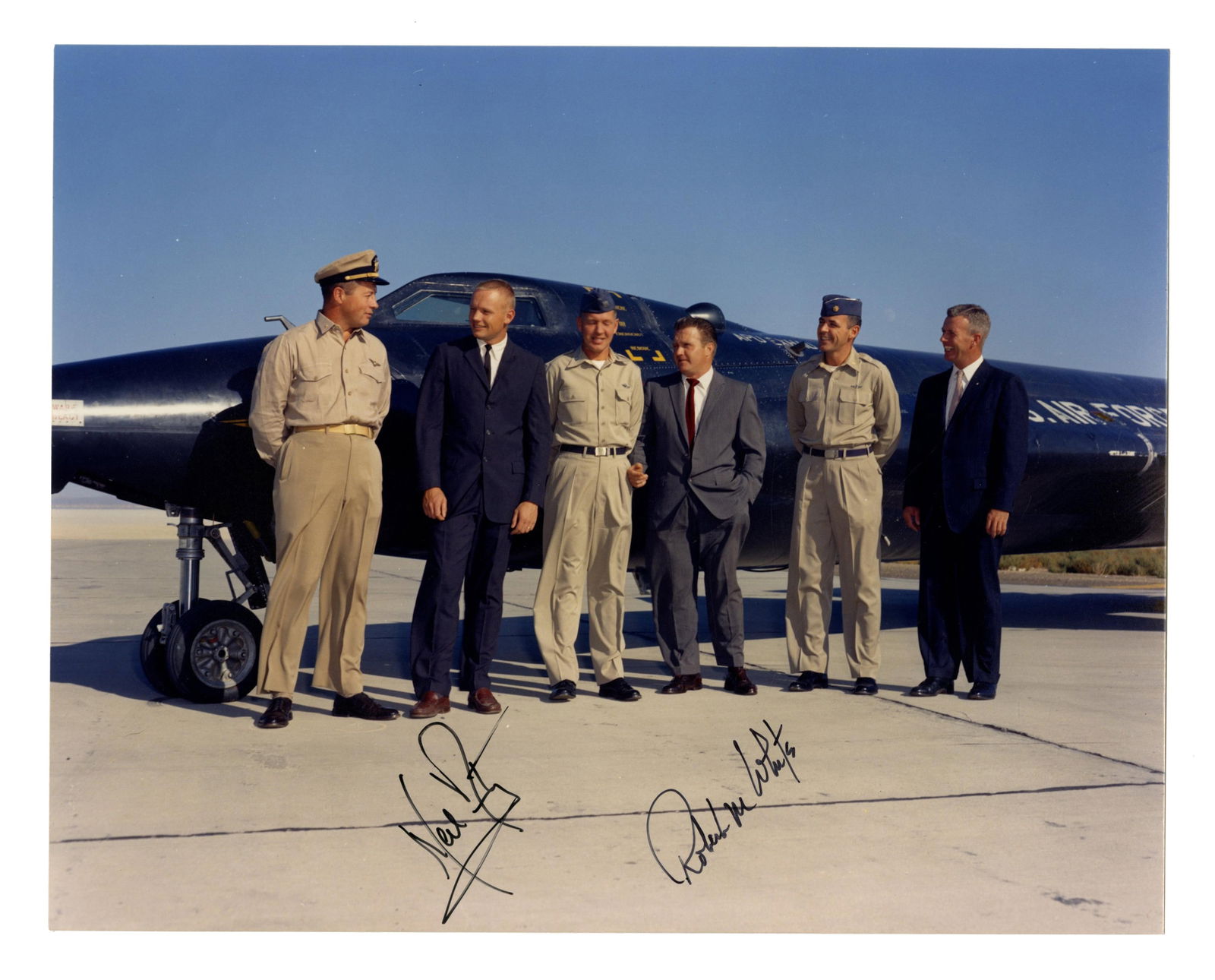 Neil Armstrong & Robert White Signed Photo With X-15 Aircraft, Pre-Cert Zarelli: Neil Armstrong n.p., ca. 1960 Neil Armstrong & Robert White Signed Photo With X-15 Aircraft, Pre-Cert Zarelli Signed photograph A full color 8" x 10" photograph showing Neil Armstrong, fellow-test