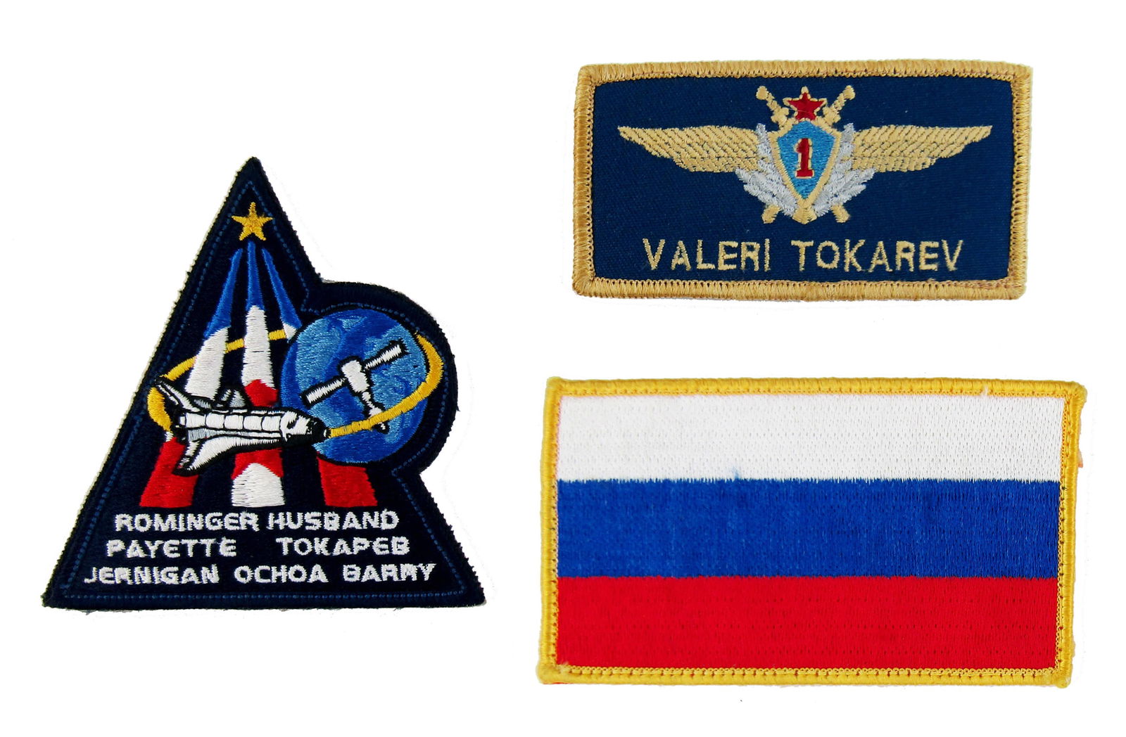 STS-96 Patches Worn by Valeri Tokarev, Very Likely Flown!: STS-96 n.p., ca. 1999 STS-96 Patches Worn by Valeri Tokarev, Very Likely Flown! Apparel A group of three embroidered patches relating to STS-96, the first Space Shuttle mission to dock at the