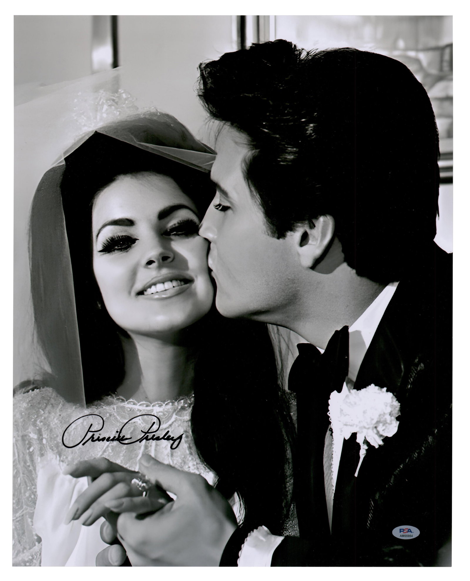 Priscilla Presley Signed Oversized Wedding Photo, PSA Authentic: Priscilla Presley n.p., n.d. Priscilla Presley Signed Oversized Wedding Photo, PSA Authentic Signed photograph A large, black and white photograph of Elvis and Priscilla Presley at their 1967