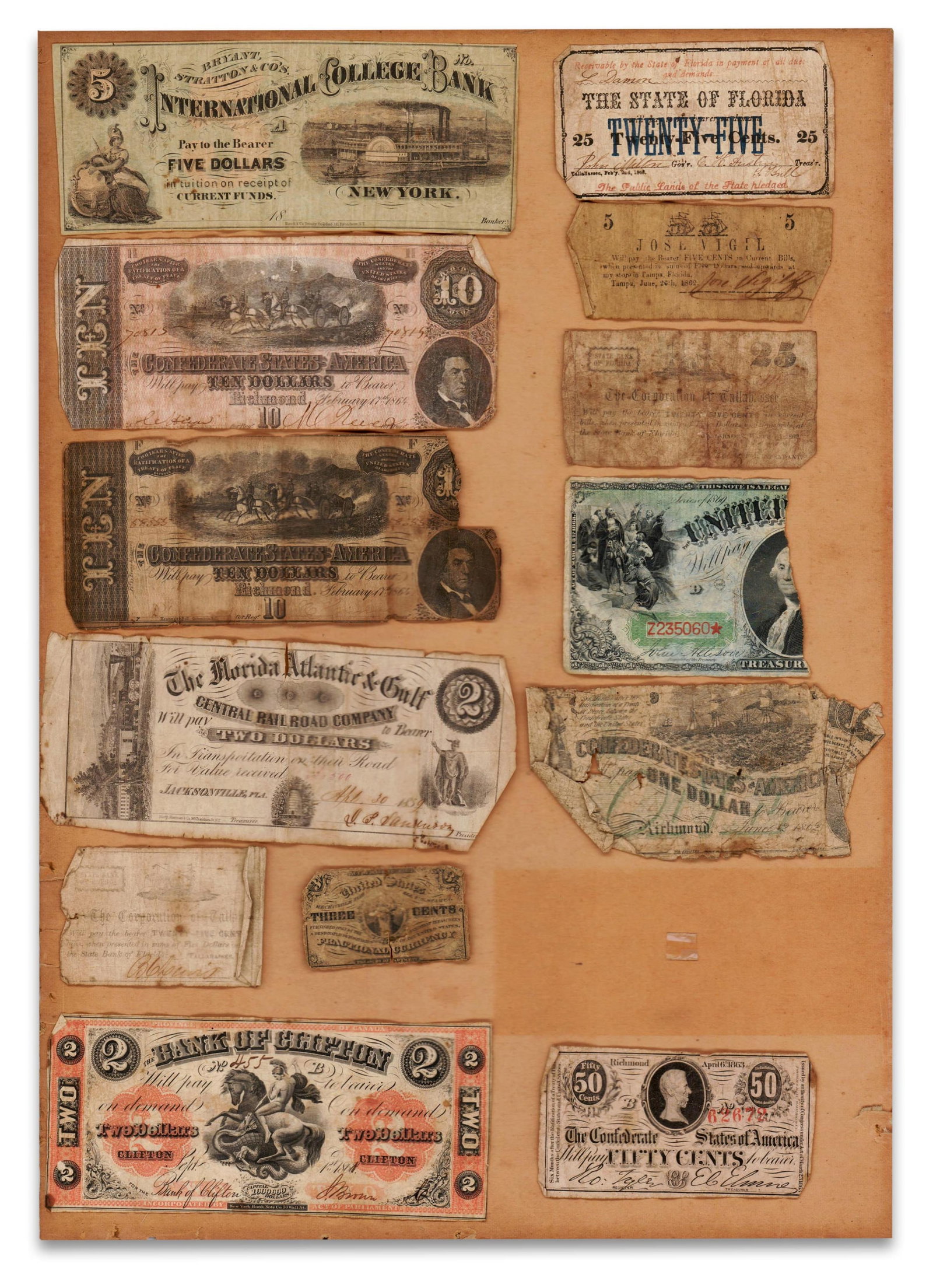 13 pc. Obsolete Currency Display 1859-69, Many Confederate War-Dated: Confederate various, ca. 1859-1869 13 pc. Obsolete Currency Display 1859-69, Many Confederate War-Dated Currency A diverse collection of 13 fractional and full denomination currency, half of which