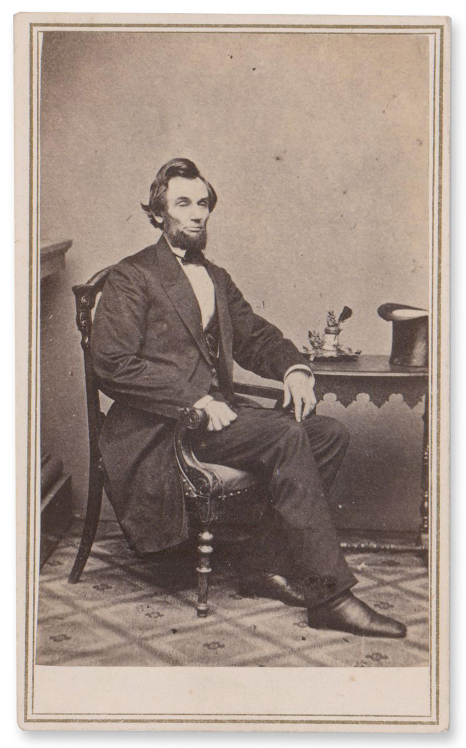 A. Lincoln CDV: The "Inkwell Pose" - Originally by Gardner in 1861, w/ a San Francisco Backstamp: Abraham Lincoln San Francisco, CA, ca. 1865 A. Lincoln CDV: The "Inkwell Pose" - Originally by Gardner in 1861, w/ a San Francisco Backstamp CDV Abraham Lincoln carte de visite, “the inkwell pos