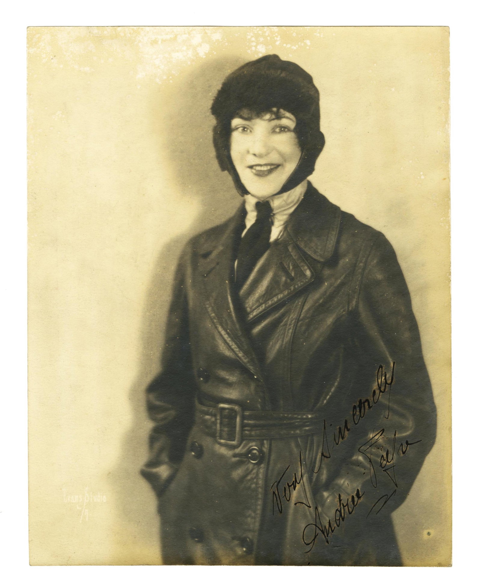 Andrée Peyre Signed Photo, Early Aviatrix Who Bested Earhart!: Andrée Peyre n.p., ca. 1920 Andrée Peyre Signed Photo, Early Aviatrix Who Bested Earhart! Signed photograph A sepia-toned publicity photo of French-born aviatrix and actress Andrée Peyr