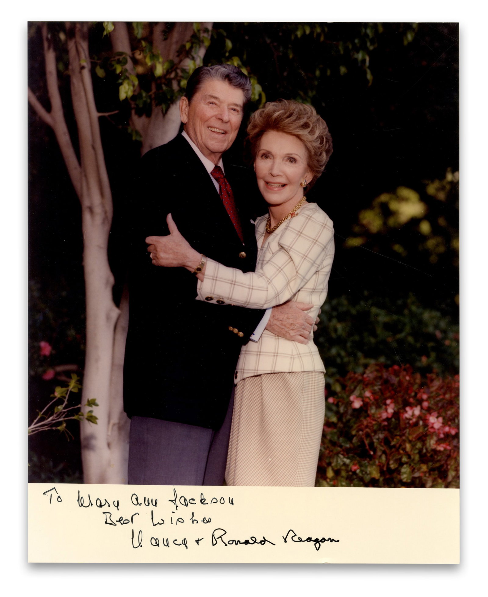 Ronald & Nancy Reagan Signed Photo: Ronald Reagan n.p., n.d. Ronald & Nancy Reagan Signed Photo Signed book A full color portrait photograph of Ronald and Nancy Reagan posed in an embrace. 1p, measures 8" x 10", n.p., undated. Inscribed