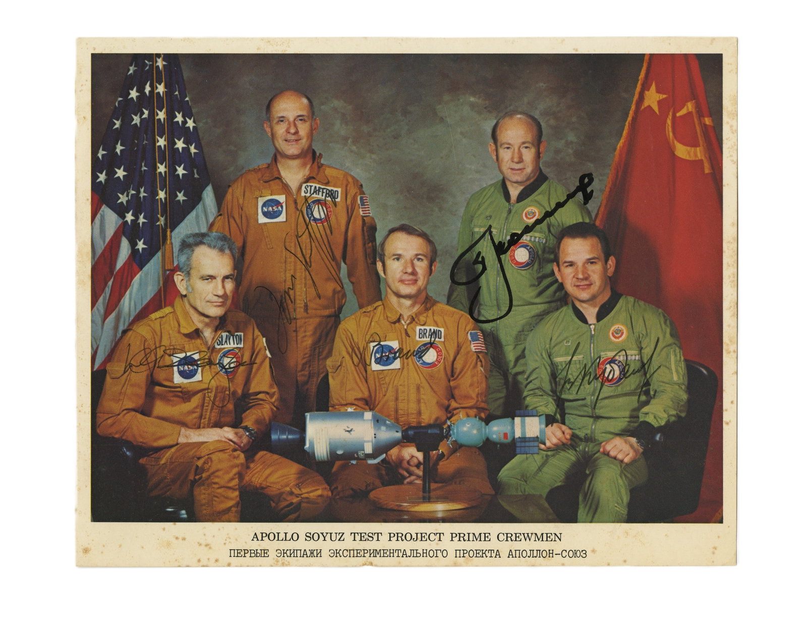 Apollo-Soyuz Signed Photo w/ LOA by Stafford: Apollo-Soyuz n.p., ca. 1975 Apollo-Soyuz Signed Photo w/ LOA by Stafford Signed photograph Official NASA photograph of the prime crewmen of the Apollo-Soyuz Test Project, signed by each in front of
