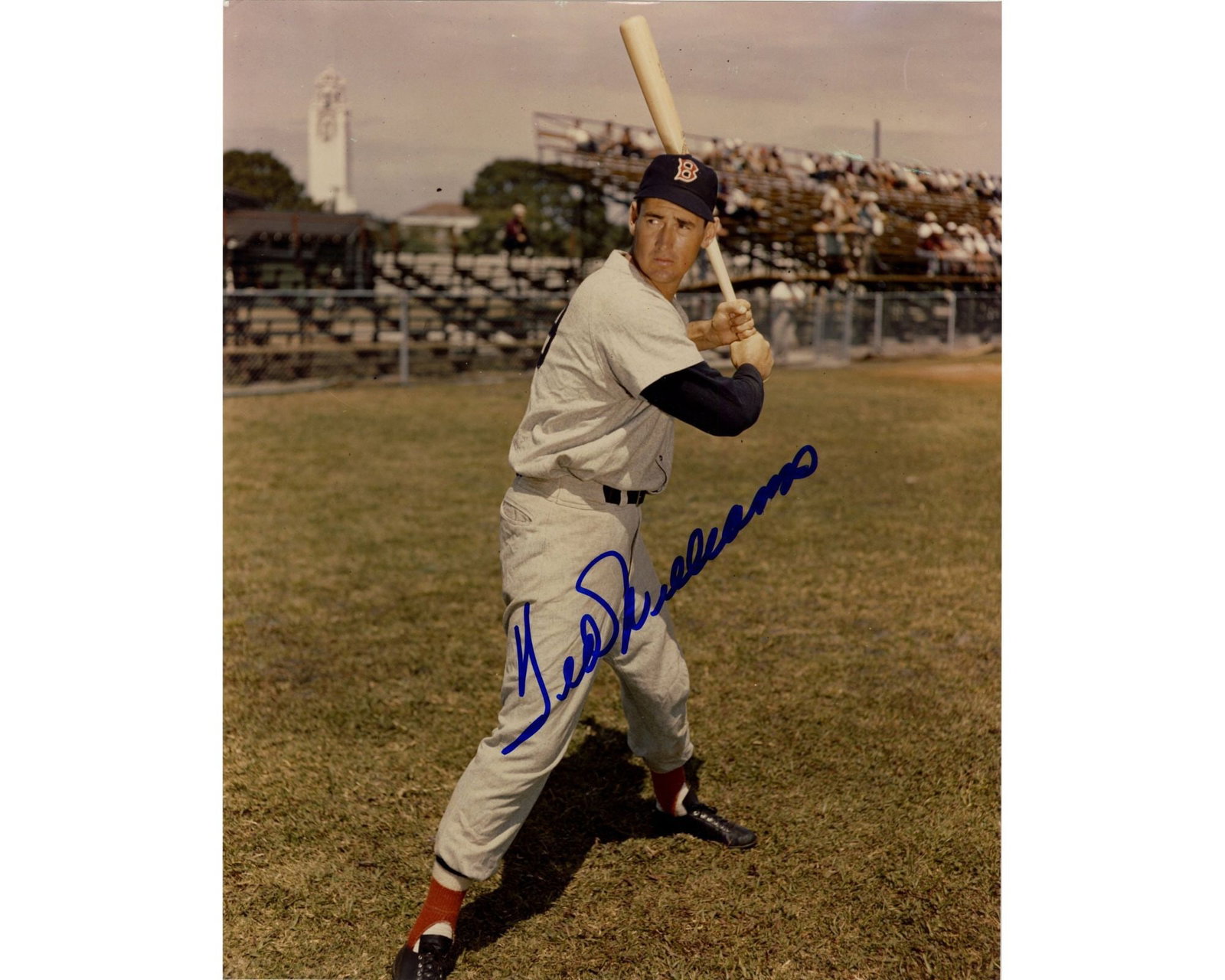 Iconic Ted Williams Boldly Signed Photo: Ted Williams n.p., n.d. Iconic Ted Williams Boldly Signed Photo Signed photograph Original vintage color photograph depicting Ted Williams (1918-2002) in full Boston Red Sox uniform, posed in batting 